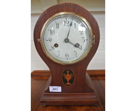An Edwardian mahogany and inlaid striking balloon clock - in working order
