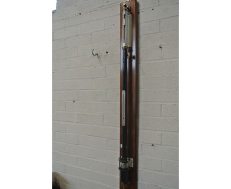 A ship's barometer with a silvered dial signed Griffin and Tatlock London Number 7576 - in working order and filled with merc