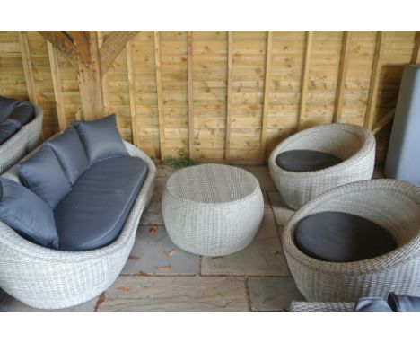 A Bramblecrest all weather Copenhagen tub two seater sofa with two  chairs and coffee table