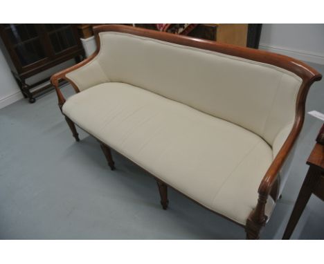 A Georgian style mahogany sofa upholstered in a cream fabric - in very good condition - 180cm x 66cm x 94cm