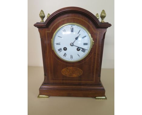 An Edwardian mahogany and inlaid striking mantle clock with key and pendulum - 28cm high - in restored and working condition