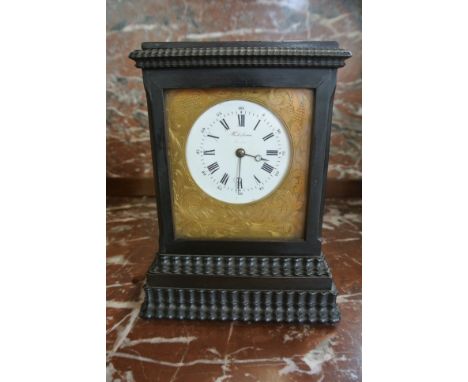 An ebonised mantle clock with a 2 1/2 inch dial signed Frodsham London - the movement numbered 113 with a platform escapement