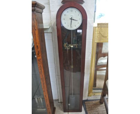 A mahogany cased Smiths electric master clock - 134cm tall - clean condition - was working in vendors house