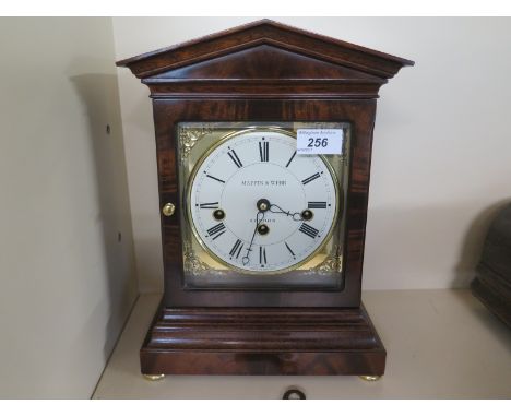 A mahogany cased mantle clock by Mapping and Webb, white enamel dial with Roman numerals, Mappin and Webb London to dial - in