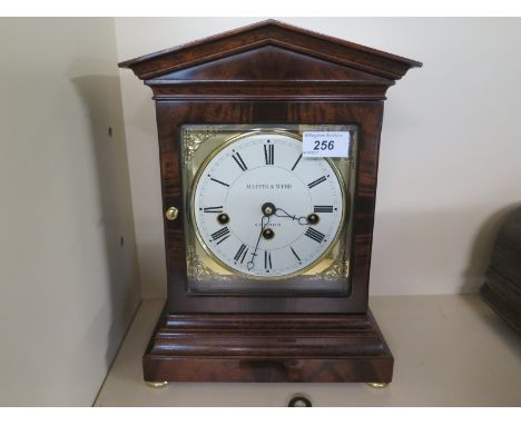 A mahogany cased mantle clock by Mapping and Webb, white enamel dial with Roman numerals, Mappin and Webb London to dial - in