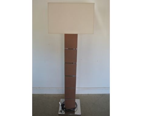 An Andrew Martin lamp in chrome and leather with a cream shade - 166cm high