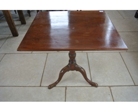 A 19th Century mahogany tilt top table on a tripod base - 72cm tall x 71cm x 64cm