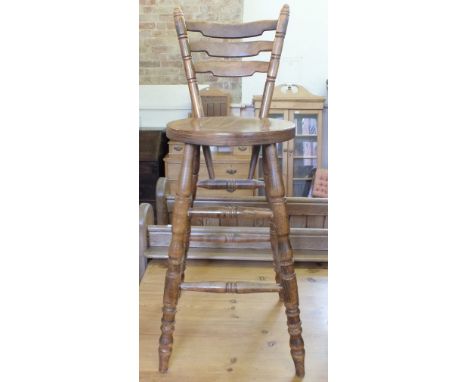 A bar stool, nest of three tables and a small shelf