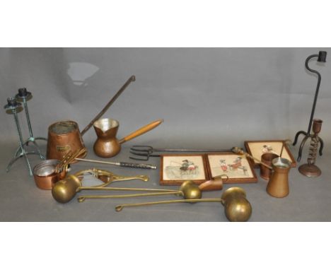 A collection of metalware including a copper cider ladle, small graduated pans, toasting forks and a mirror, (qty)