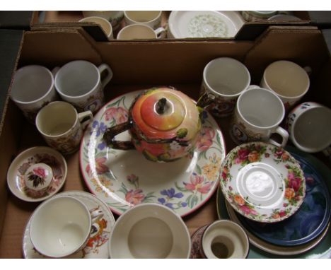 A mixed collection of items to include Jersey pottery candlestick: apple teapot, commemorative mugs, Mason's trinket box etc 