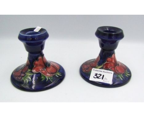 Moorcroft Clematis on blue ground pair of candlestick holders: height 8.5cm. 
