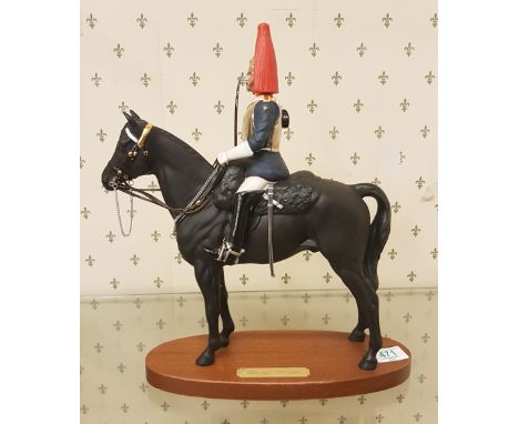 Royal Doulton Connoisseur model of mounted Queens Guardsman ''Blues and Royals'', height 38cm
