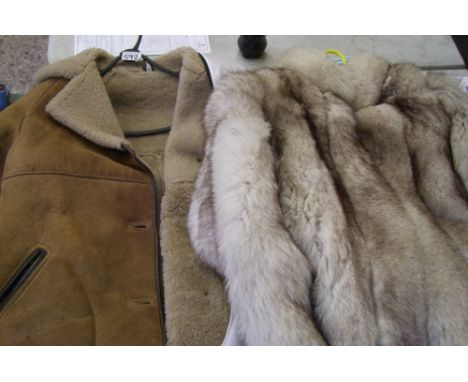 A Taube vintage sheepskin ladies coat: together with a faux fur jacket (2). 