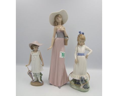 Three Nao figurines : lady holding a basket , girl with dog , girl with parasol . height of tallest 36cm (3) 