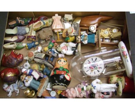 A mixed collection of ceramic and resin items: continental figures, Russian Doll set etc (1 tray). 