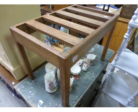 A vintage beech luggage rack