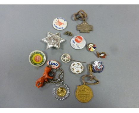Group of vintage pins and badges including Butlins, ESSO, horse racing, BEA etc