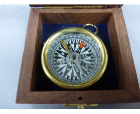 Brass cased compass in a wooden box