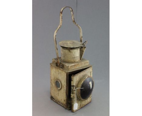 Vintage railway lamp with red glass front 