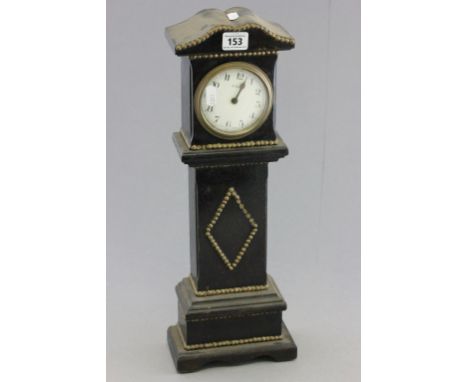 A small (minature) French 8 day oak long case clock; with brass studded decoration