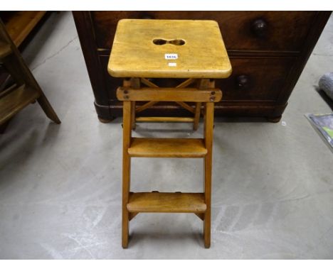 A vintage set of fruit wood dresser steps