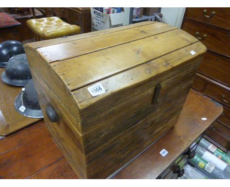 A vintage pine dome topped tack box