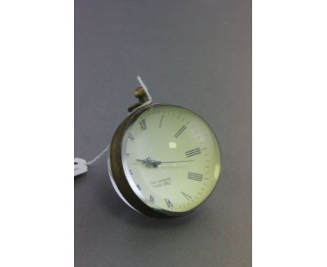 A brass desk ball clock 