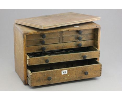 Vintage Oak Tool Cabinet, the front panel opening to reveal fitted drawers with some tools