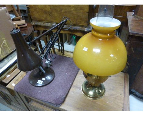 A vintage angle poise lamp and brass oil lamp