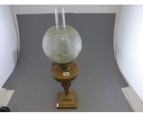 A Victorian brass oil lamp