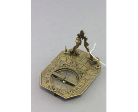A brass cased sundial & compass by F Cox of London