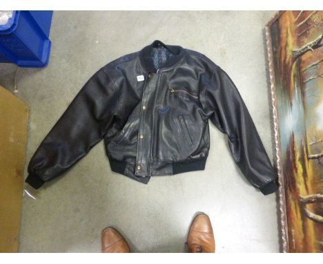 A vintage leather jacket together with a vintage suede jacket