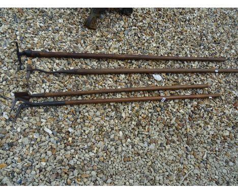 Four vintage garden tools