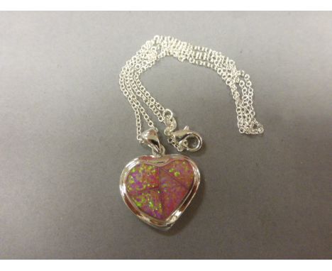 A silver & pink opal heart shaped pendant necklace