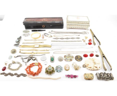 A collection of vintage costume jewellery to include a branch coral bracelet, gold tone necklace, loose beads, feather quills