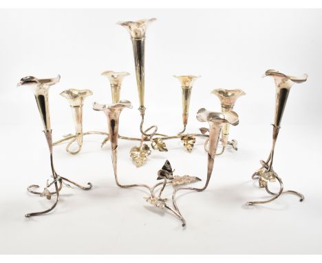 An early 20th Century silver plated centre piece epergne having five tapering sconces raised on a vine leaf base. Marked made