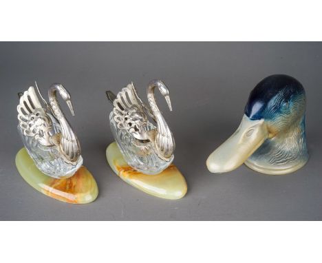 A vintage French metal "Duckey" bottle opener made in Paris. Name to underside. Approx. 8 cm tall. Together with 2 swan salts
