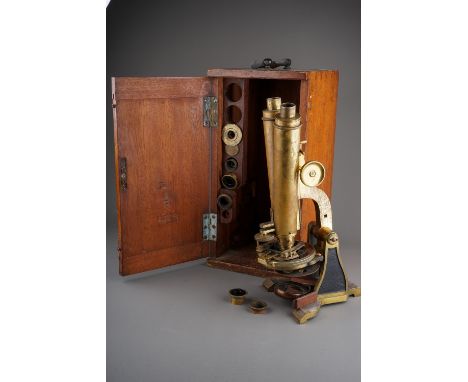 Antique 19" Century brass binocular microscope in case.  Signed W Heath Plymouth.  Various lenses etc. 