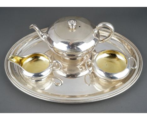 An early 20th Century Austro-Hungarian 800 standard plain silver four piece tea service comprising teapot, sugar bowl, milk j