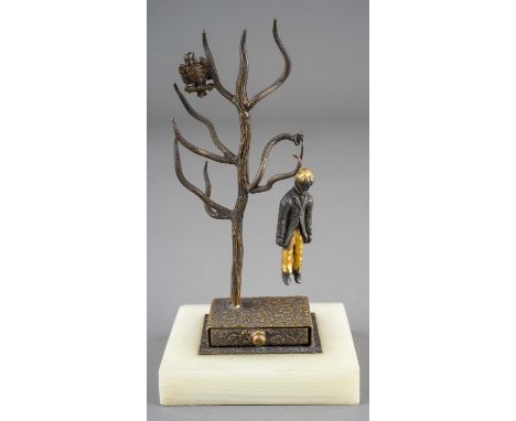 A late19th century French G. Boutigny Palais Royal novelty ring tree in the form of a gilt metal man hanging from a noose on 