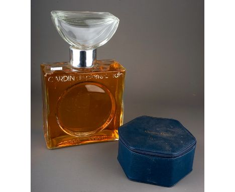 A counter top display bottle of Pierre Cardin 'Cardin de Pierre Cardin' aftershave, with contents, the oversized glass bottle