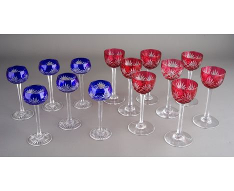 Eight Continental style cut ruby glass liquor glasses together with six St Cloud style blue flash glass liquor glasses (1 box