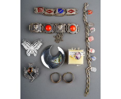 A collection of white metal jewellery, including enamelled souvenir bracelets, filigree brooch, blue john ring; etc 