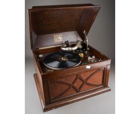 A cased vintage Gramophone "His Master's Voice" retailed by Russell &amp; Co., with needles 