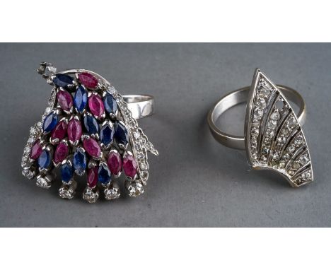 A white gold diamond, ruby and sapphire dress ring, unmarked assessed as a minimum of 9ct, gross weight approx 7.9g; together