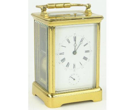A brass cased carriage clock with alarm repeater,
height 5.25".