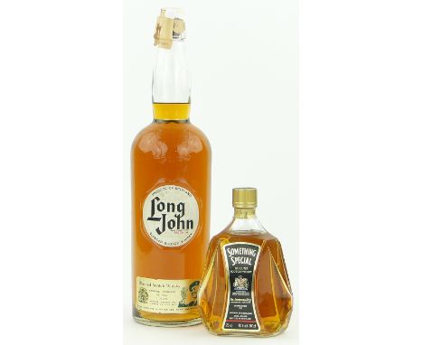 A Tregnum bottle of Long John blended Scotch Whisky 
(2 quarts) height 17" & a bottle Something Special de luxe Scotch whisky