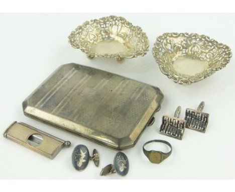 A group of silver items,
including cigar cutter, cigarette case, cufflinks, etc.