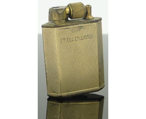 A 9ct gold mounted pocket lighter,
height 5.5cm.
