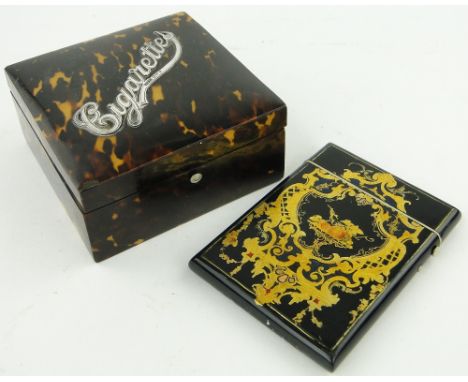 A Victorian tortoiseshell clad cigarette box with silver mount,
4" across, and a Victorian gilded and painted card case, (2).